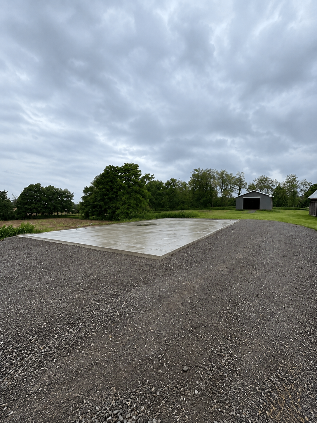 Concrete slab foundation prepared for the pole barn